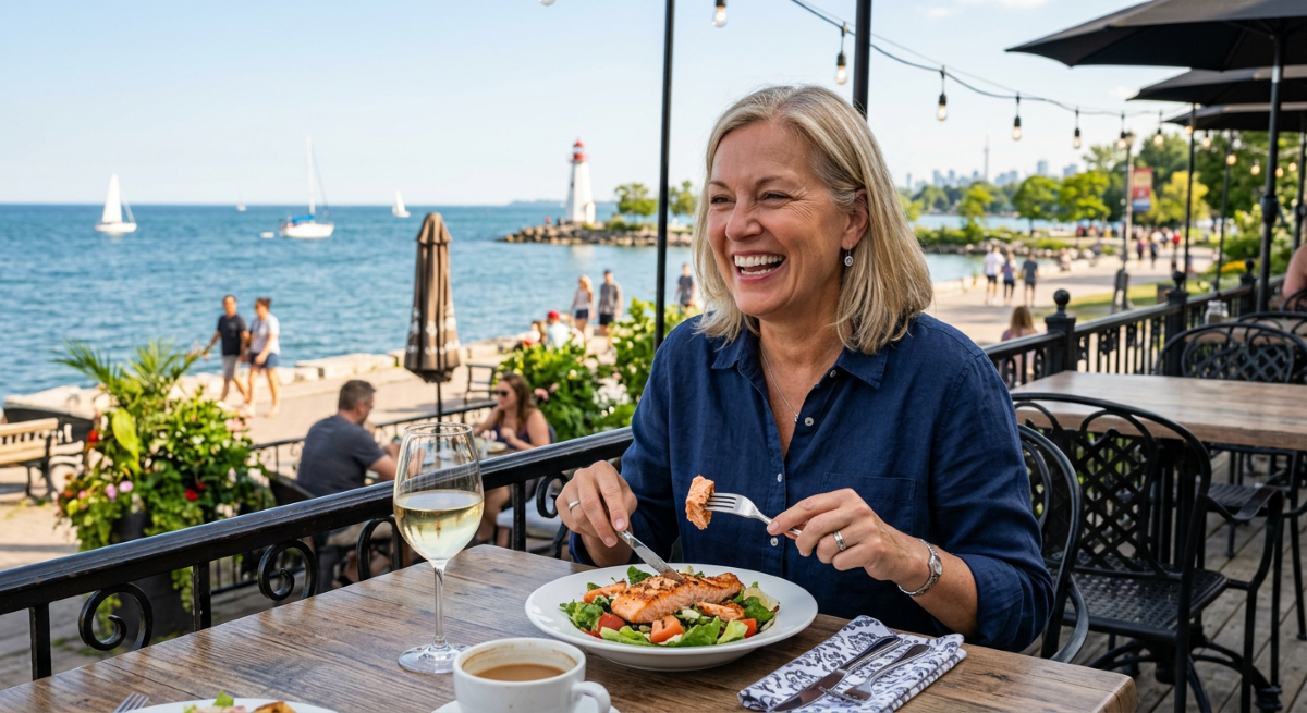 All-on-4 dental implant patient eating a full meal at a Mississauga restaurant, demonstrating restored chewing function and confidence after full-arch fixed prosthesis placement at North Star Dentistry